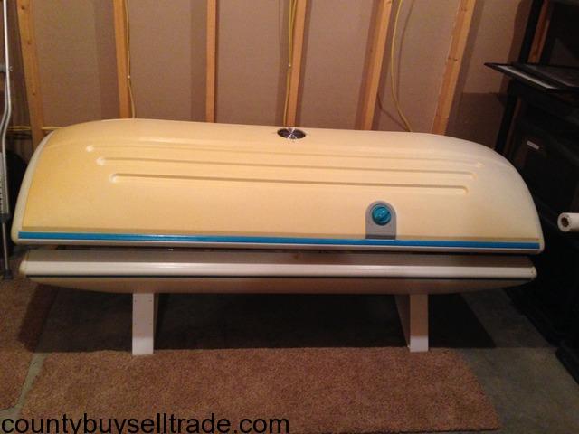 sunquest tanning bed lid wont stay closed